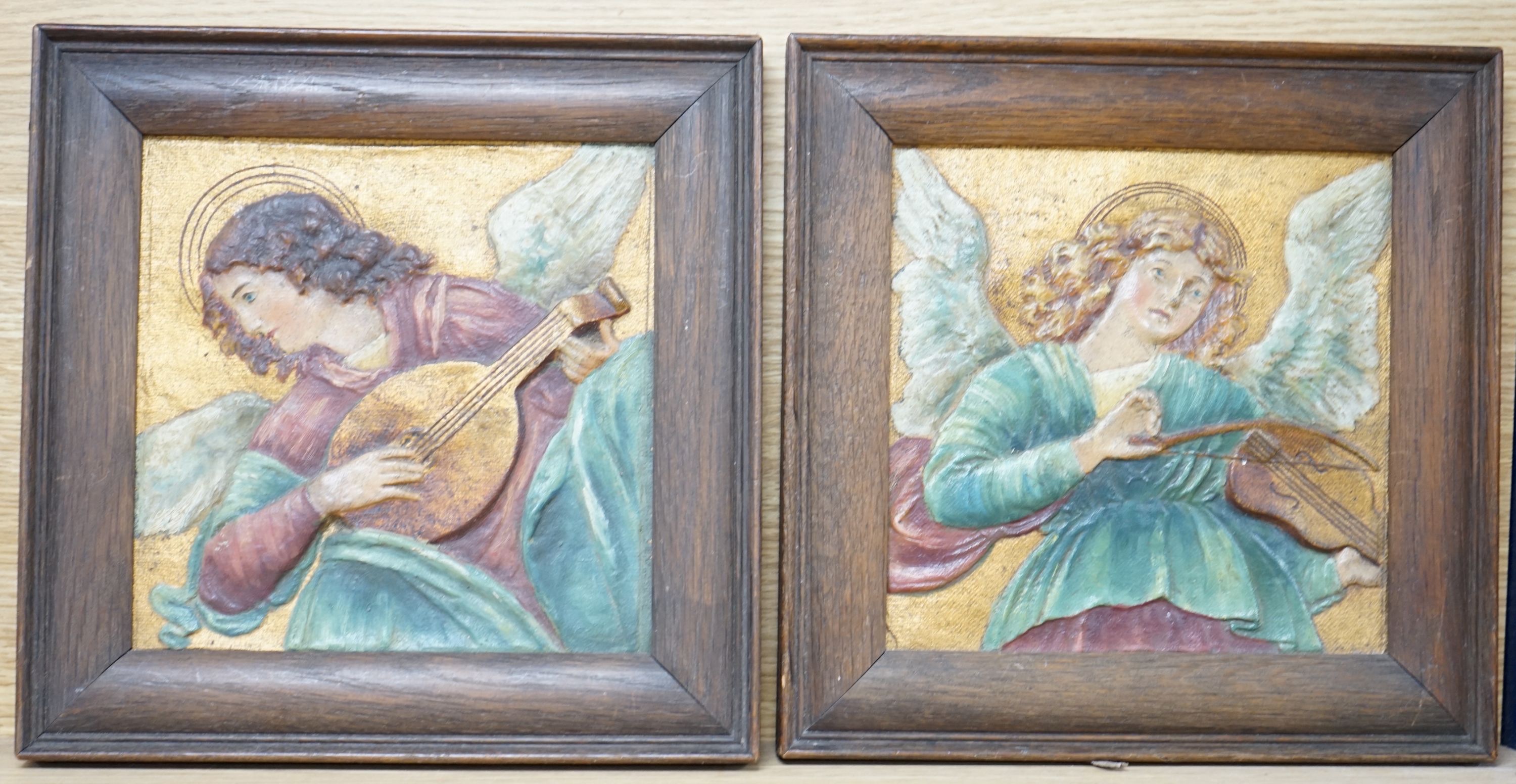 Continental School c.1900, a pair of embossed and painted canvas panels, Angels playing instruments, 18 x 18cm